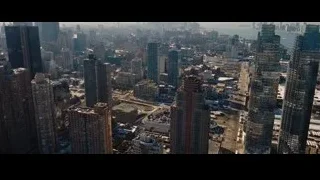 aerial city view with smoke plume — Batman: The Dark Knight Rises