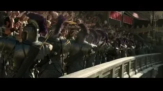 people in armor with spears on bridge — Gladiator 2