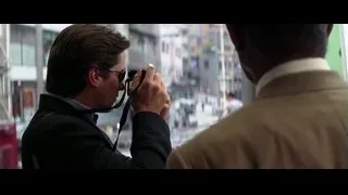 Man in suit and sunglasses on city street — Batman: The Dark Knight