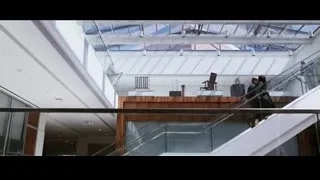 People walking up glass stairs — Jobs