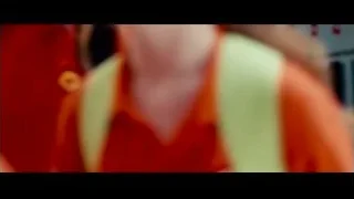 Young girl with backpack in front of train — The Karate Kid