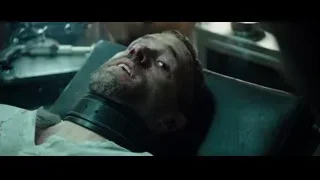 distressed man on hospital bed with blood — Deadpool