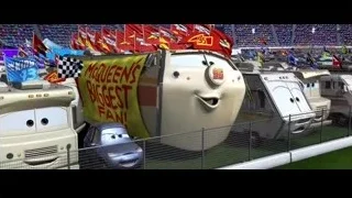 cars at race track McQueen's fan banner — Cars