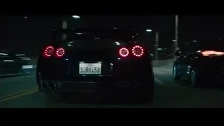 woman driving sports car at night — Furious Seven