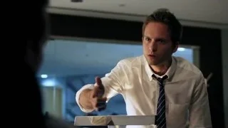 man in white shirt pointing — Suits