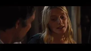 woman looking seriously at man with closed eyes — Now You See Me