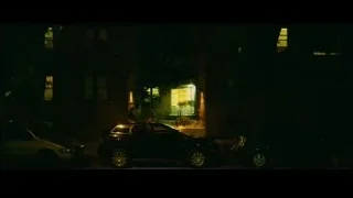 street at night with parked cars and building — Whiplash