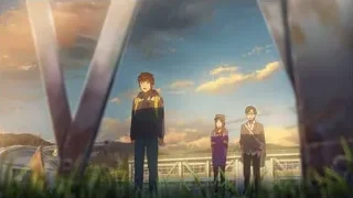 Three young people in grassy field at sunset — Your Name
