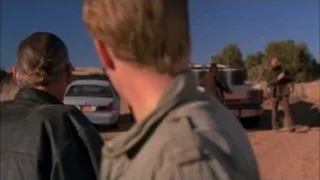 four men talking in desert with pickup truck — Breaking Bad