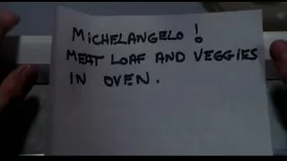 Hand holding recipe note in kitchen — Spider Man