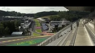 person looking at race track with Ferris wheel — F1
