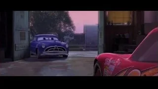 two Cars characters parked in garage — Cars
