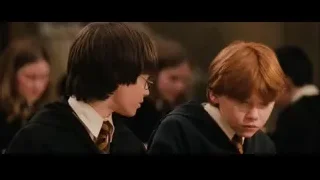 Harry Potter and Ron Weasley sitting in classroom — Harry Potter and the Philosophers Stone