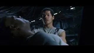 two men in dark room with wires — The Matrix