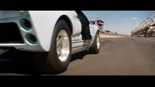 White sports car driving on race track — Ford v Ferrari