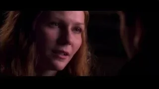 Young woman with blonde hair looking serious — Spider Man 2