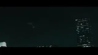 Man sitting in helicopter cockpit at night — Furious Seven