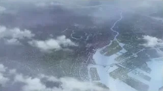 Aerial view of city with river — Weathering with You