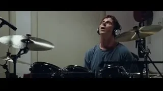 man playing drums in recording studio — The Big Short