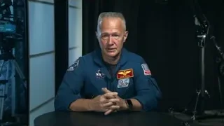 man in blue space suit in studio — Elon Musk: Return to Space