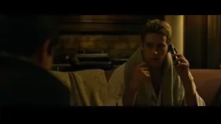 man in towel talking on phone — The Social Network