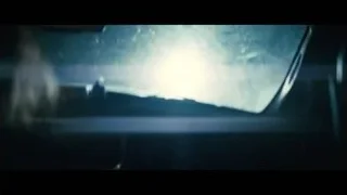young woman sitting in car — Interstellar