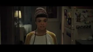 young woman in kitchen with headscarf — Creed 2