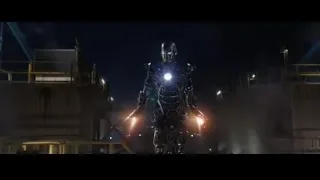 Robot standing in dark industrial area — Iron Man 3