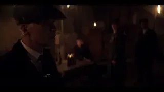 man in suit and cap in dark room — Peaky Blinders