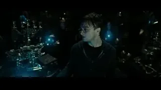 young man with glasses in blue lit room — Harry Potter and the Deathly Hallows 2