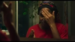 woman crying with red headscarf — The Bear