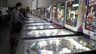people playing pinball machines — Screened Out