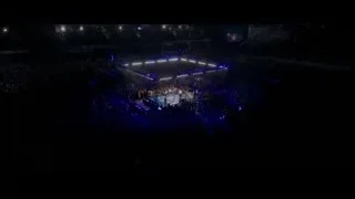 wrestling ring in large arena — Creed