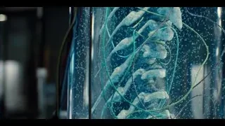 woman in dark room with oxygen tank — Jurassic World