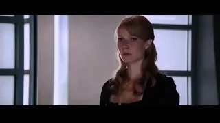 young woman with red hair by window — Iron Man