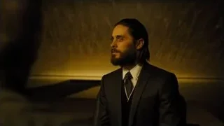 man with beard in dimly lit room — Blade Runner 2049