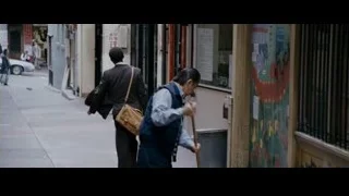 two men walking with stick on narrow street — The Persuit of Happyness