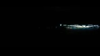 two police officers in car at night — Batman: The Dark Knight Rises