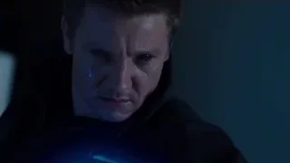Man's face lit by blue light — The Avengers