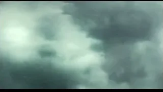 person on boat in rough water — Life of Pi