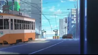 city street with tram and tall buildings — I Want To Eat Your Pancreas
