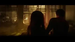 Couple in burning room looking at cityscape — Spiderman: No Way Home