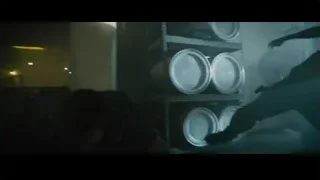 two men with gun in dimly lit room — Furious Seven