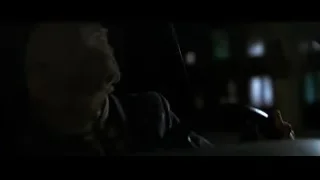 white van parked in parking garage — Batman: The Dark Knight