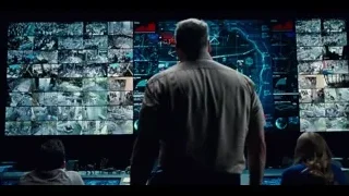 man looking at large screen map display — Jurassic World