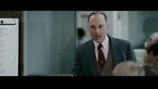 Man in suit speaking to group — The Persuit of Happyness