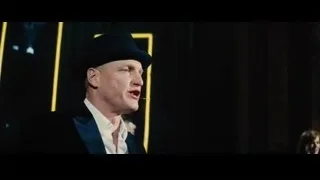 Man in suit and hat praying — Now You See Me