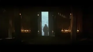 person standing in doorway of dark room — Batman