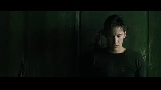 Young man sitting in dark room — The Matrix