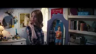 Young woman looking in mirror — La La Land